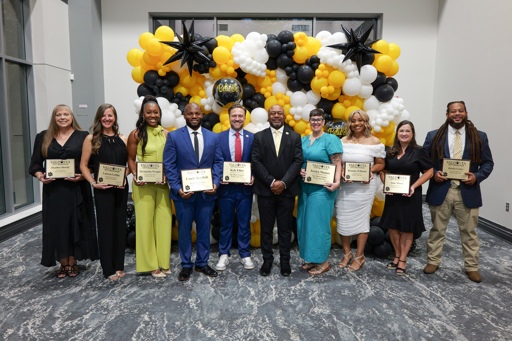 Group photo of winners with Superintendent