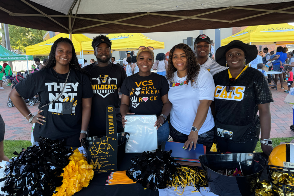 Group photo of our employees at VCS Booth