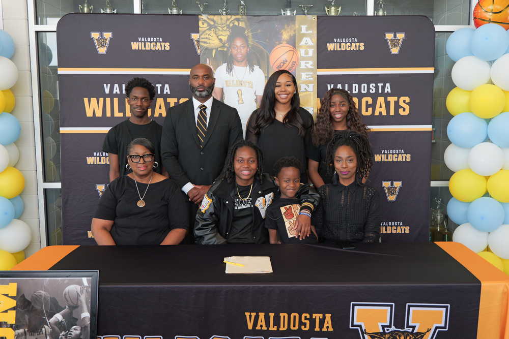 Lauren with family and coaches