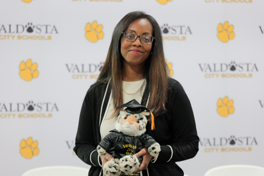 Dr. Lockhart holding Willie the Wildcat