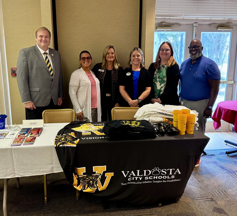 VCS staff with Moody AFB staff at VCS table