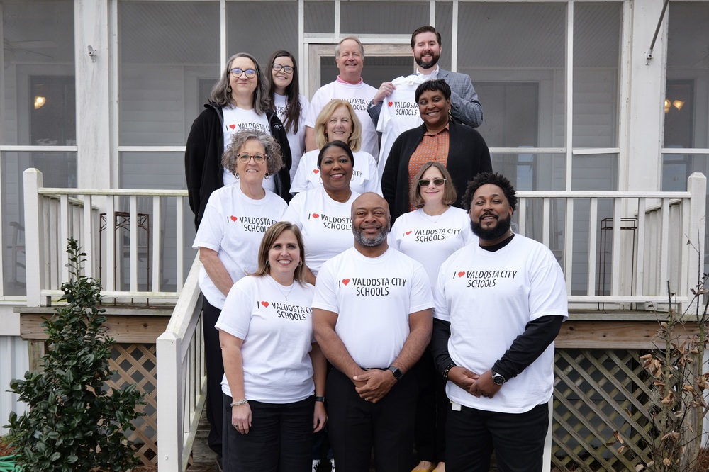 Group photo of VCS Employees wearing the I Love Public Education shirts