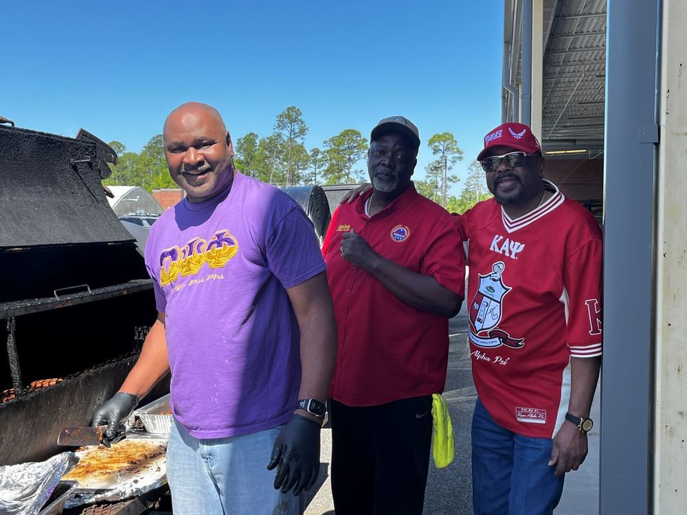 photo of donors grilling food