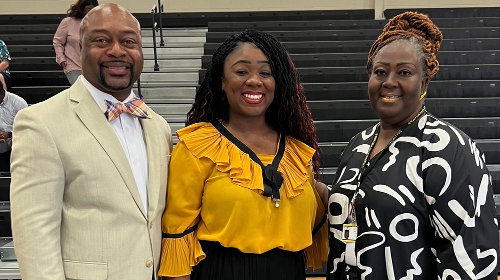 Teacher with Board Chair and Superintendent