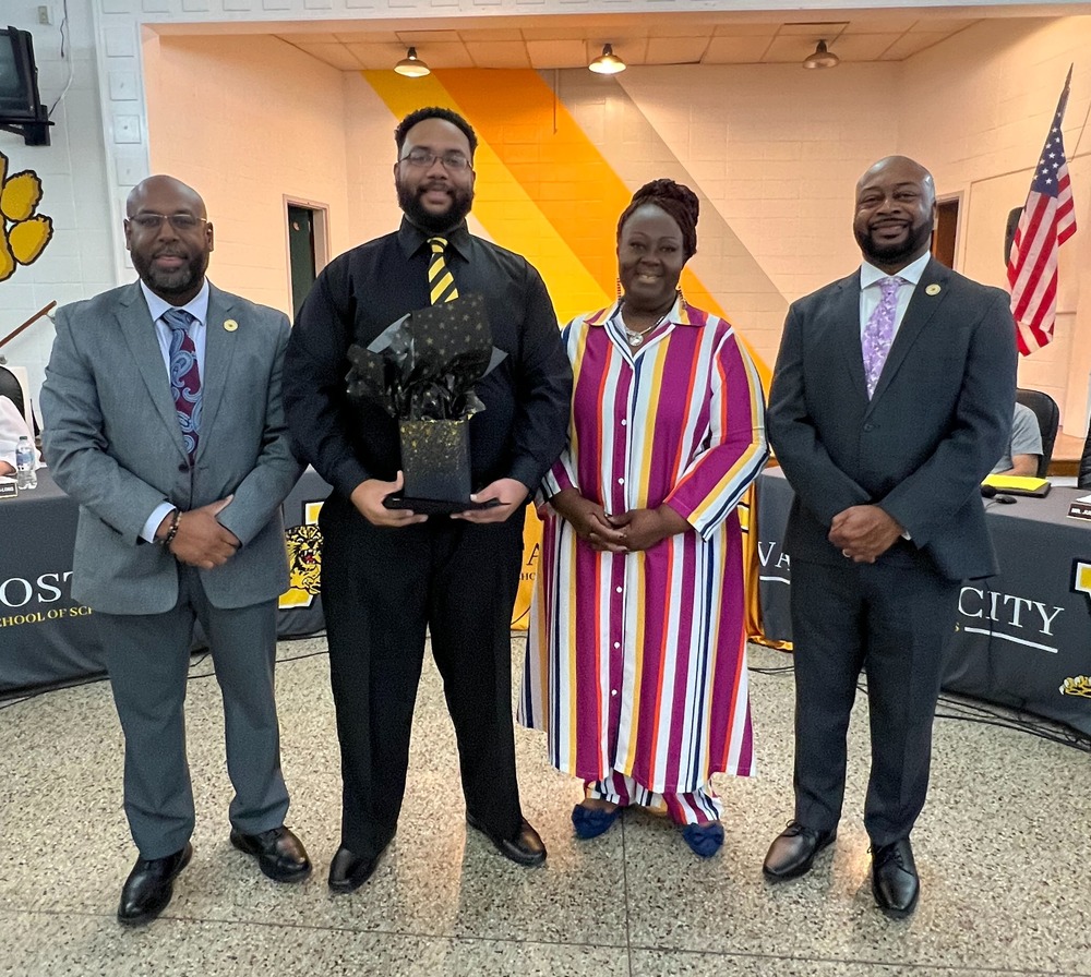 Matthew Brown with Superintendent, Board Chair and Assistant Superintendent of Operations