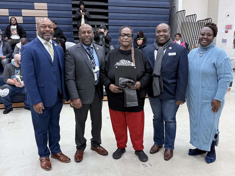 Group photo of Ms. Morrison and other VCS faculty, and VCS Board Chair