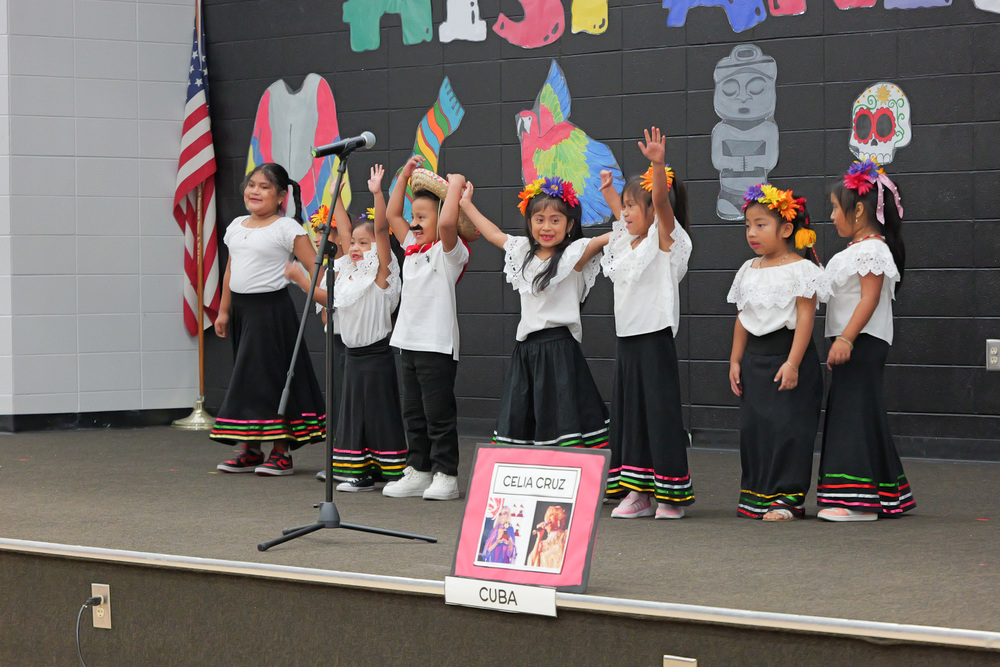 Group of students dancing for the program