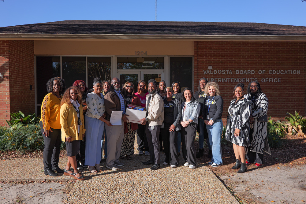 Group photo of VCS representatives with donors