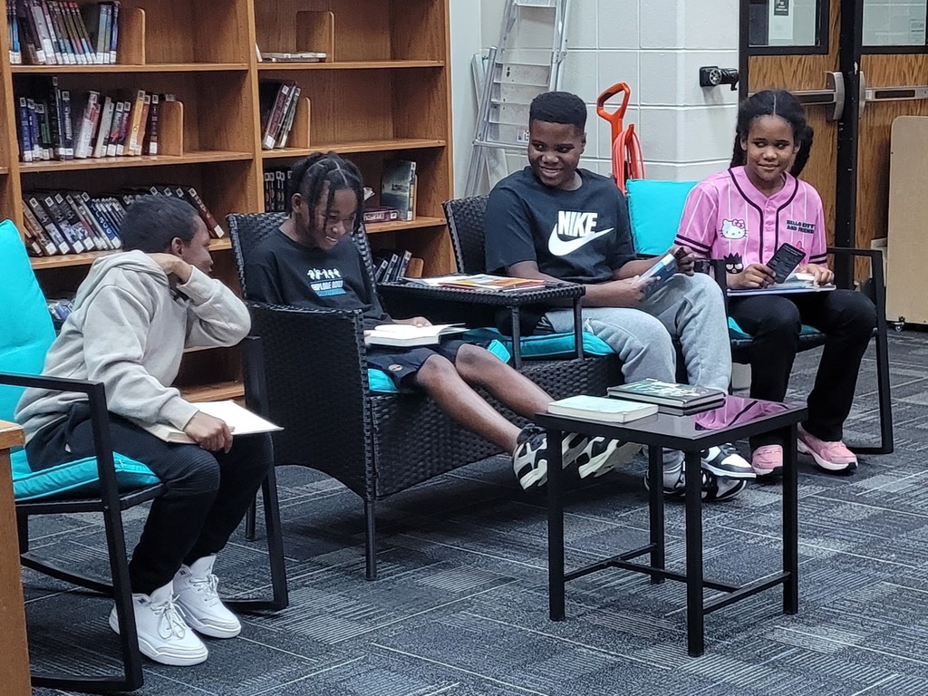 Students reading in the library at VMS