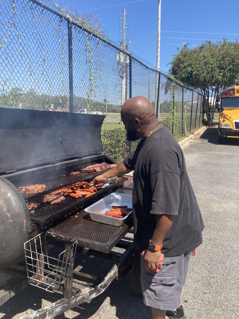 someone from transportation grilling 