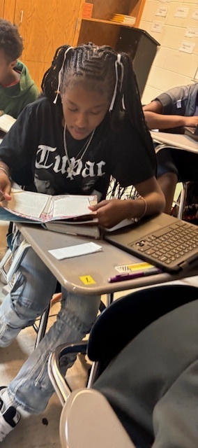 Student reading a book