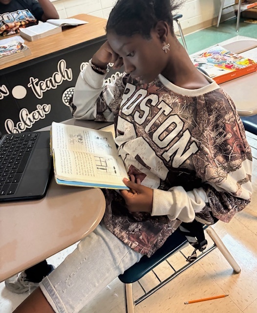 Student reading a book