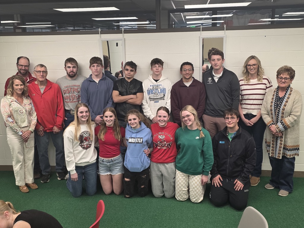 Pictured here are the state qualifying wrestlers with the school board members