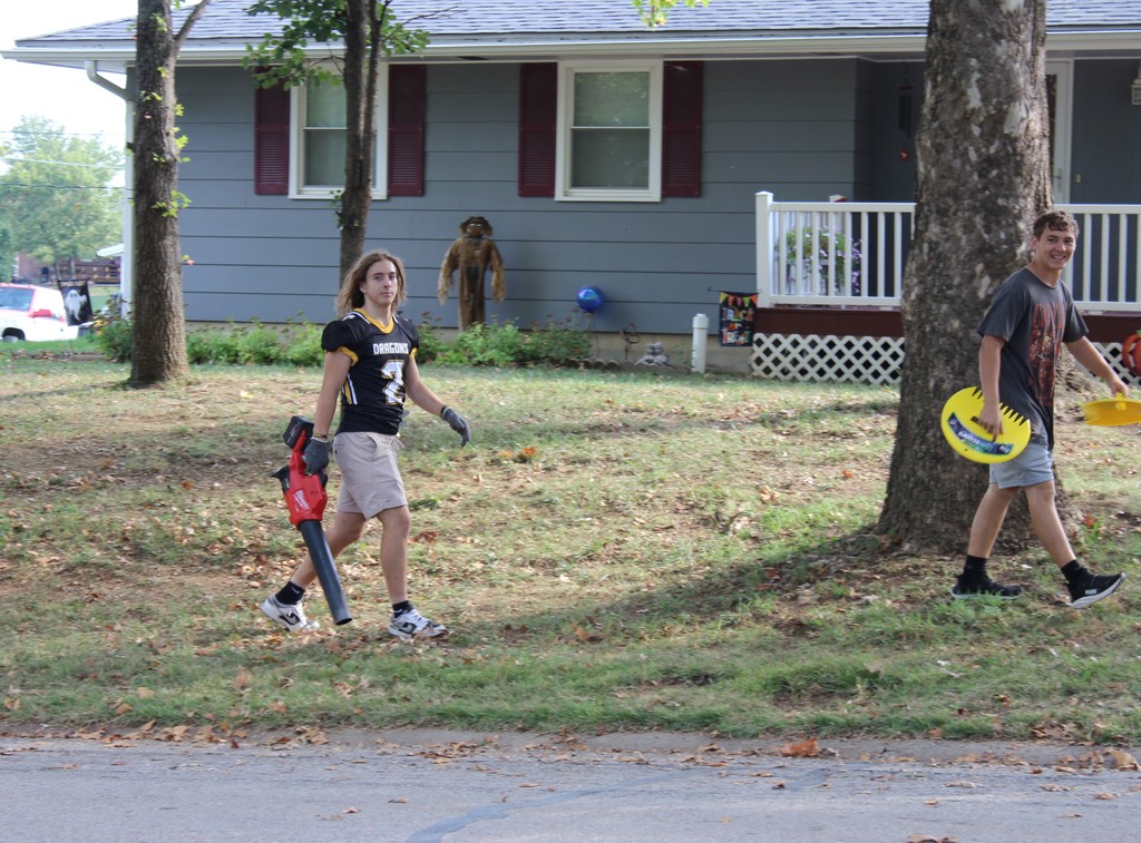 Boys helping with yardwork