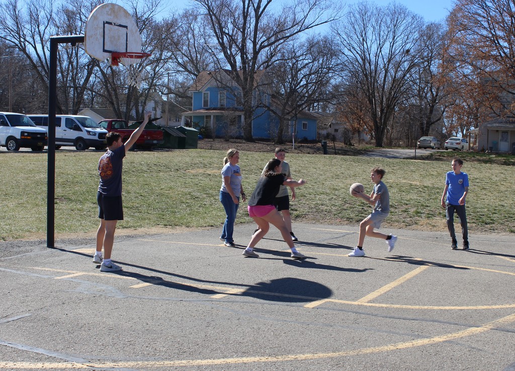 Kids playing basketball