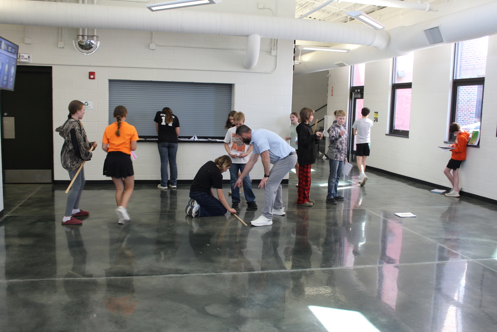 Mr. Courter helping students