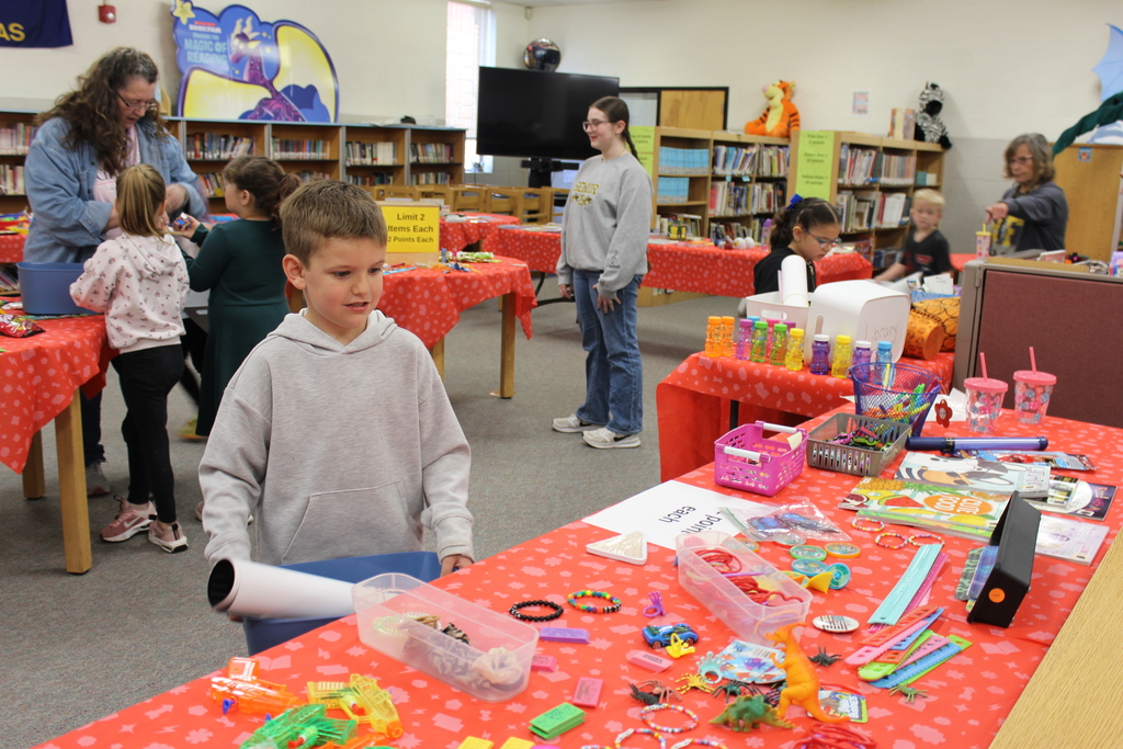 Boy choosing prizes