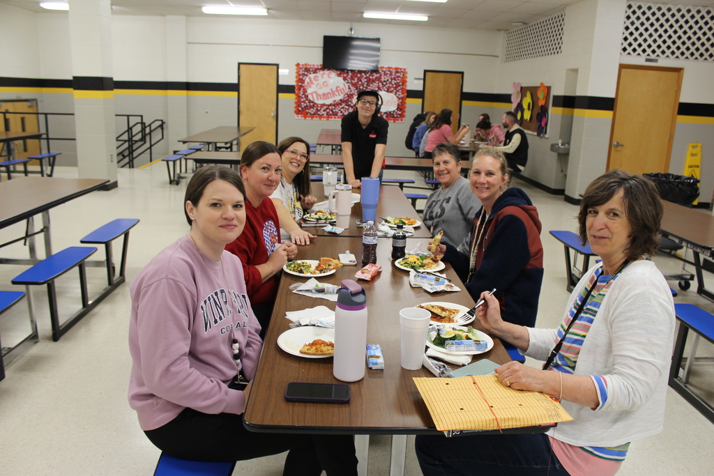 Staff eating in lunchroom