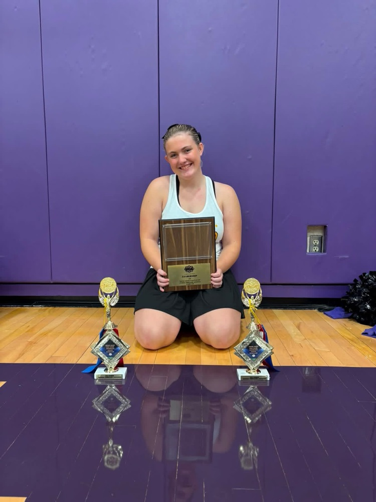 Ellie with trophies  