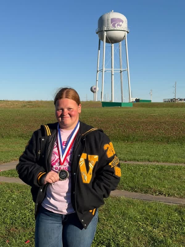 Taygen with medal