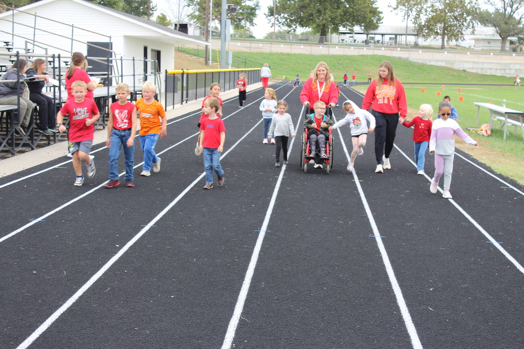 Large group of walkers at track