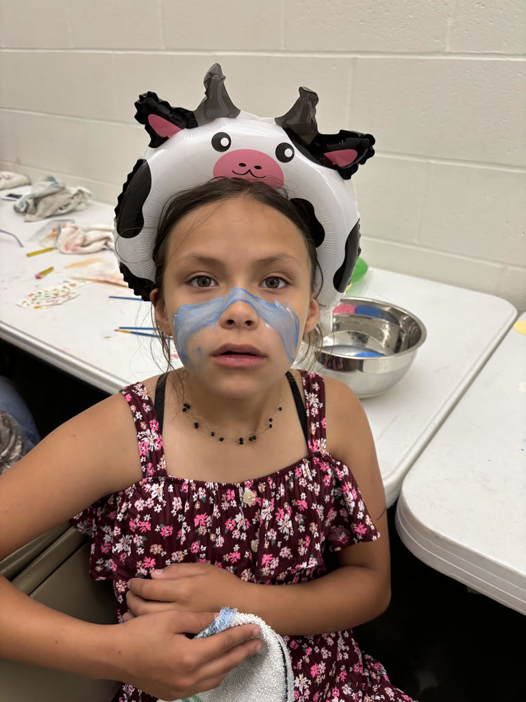 Girl with cow hat