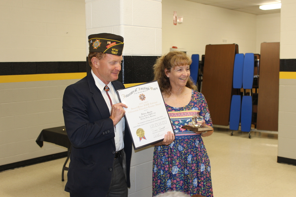 Deb receiving award
