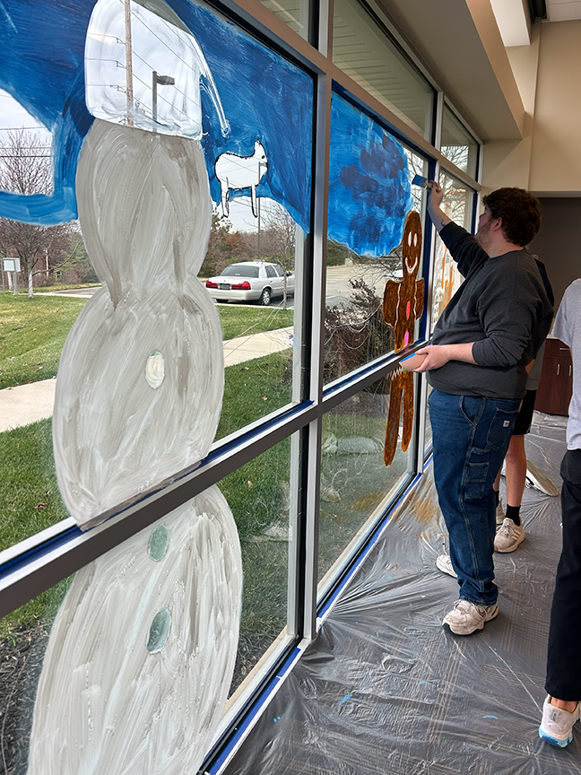 ❄️🎨 Our Art II & Printmaking students took their creativity on the road, painting a Winter Wonderland on the windows at Twin Oaks City Hall! A fun way to share their talent and spread some seasonal magic. 💙🧡 #VPPride #OneCommunity