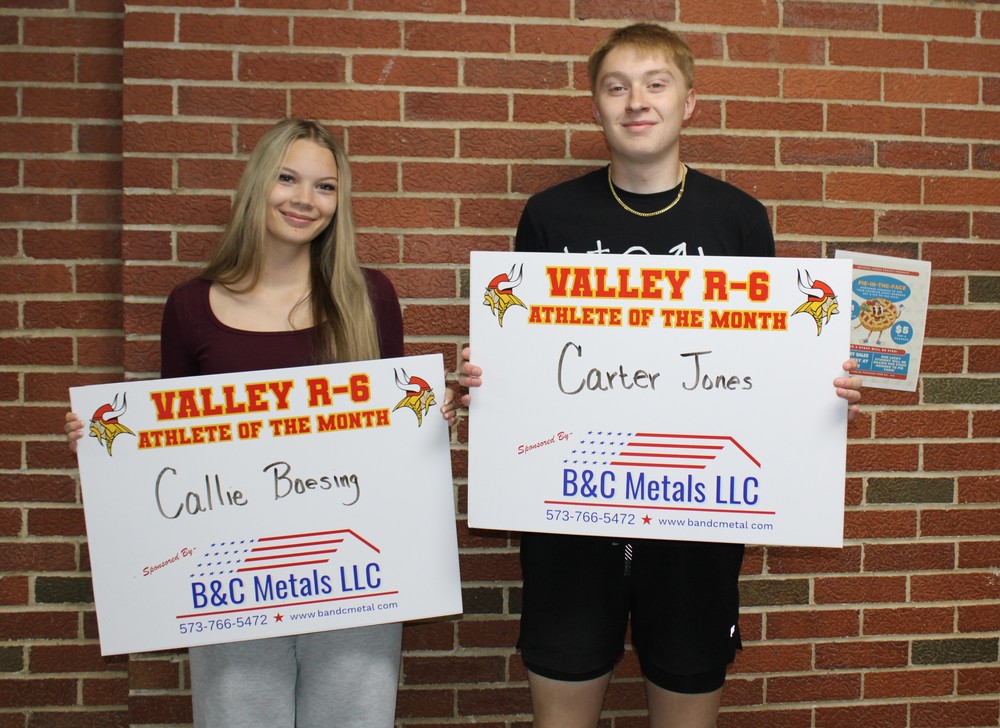 Students posing for athlete of the month