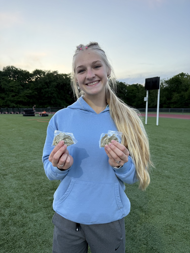 Student Receiving Track Medals