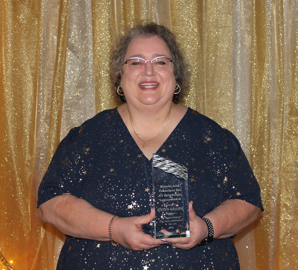 Teacher receiving award
