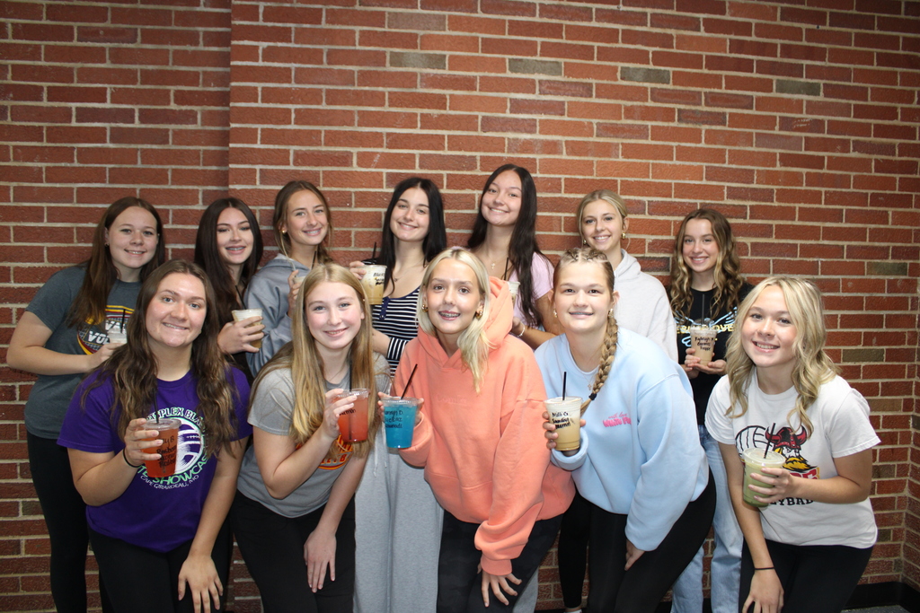 Volleyball team receiving drinks