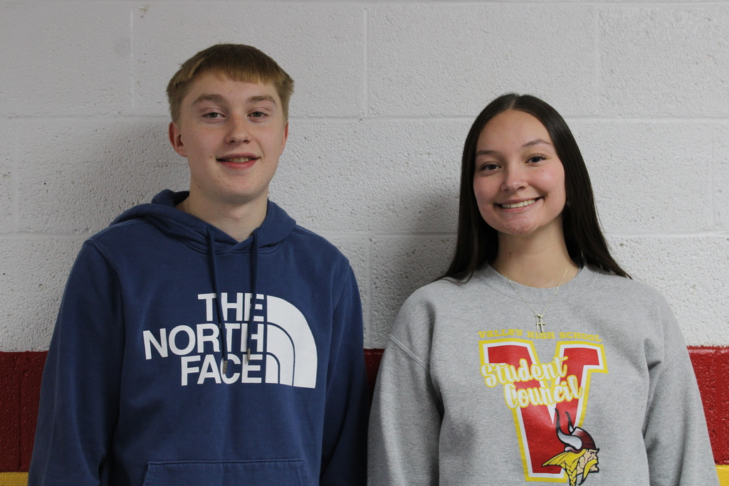 Two Students Posing for an award
