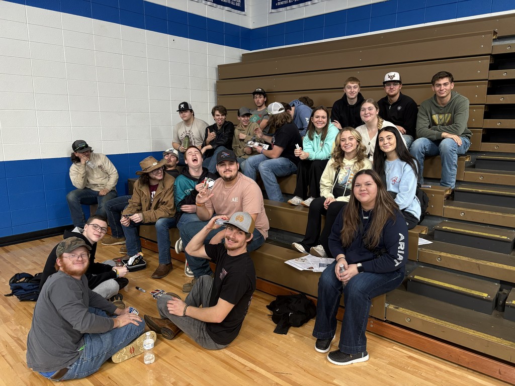 Students sitting on the bleachers