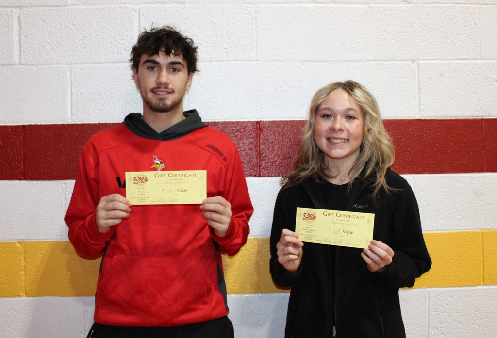 Students holding up certificates