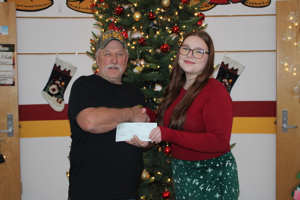 Student accepting donation