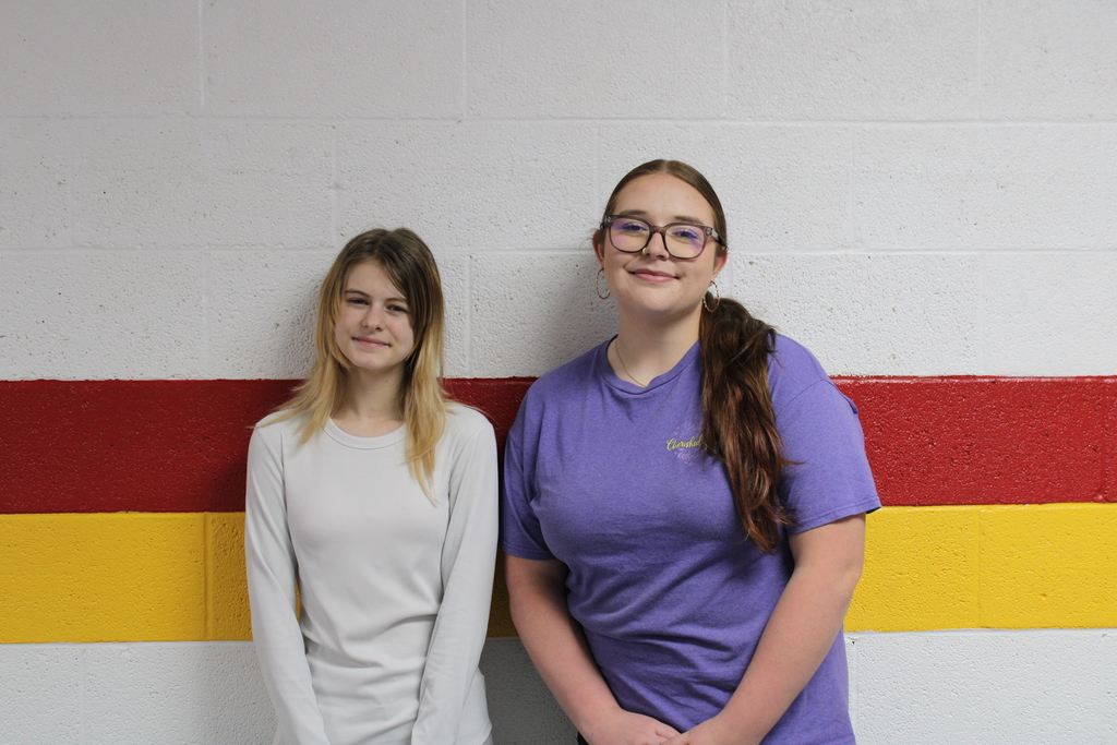 Two students posing for student of the month
