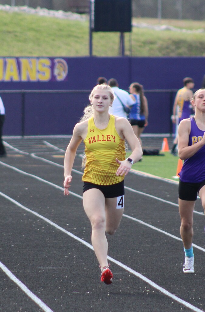Student running in track meet