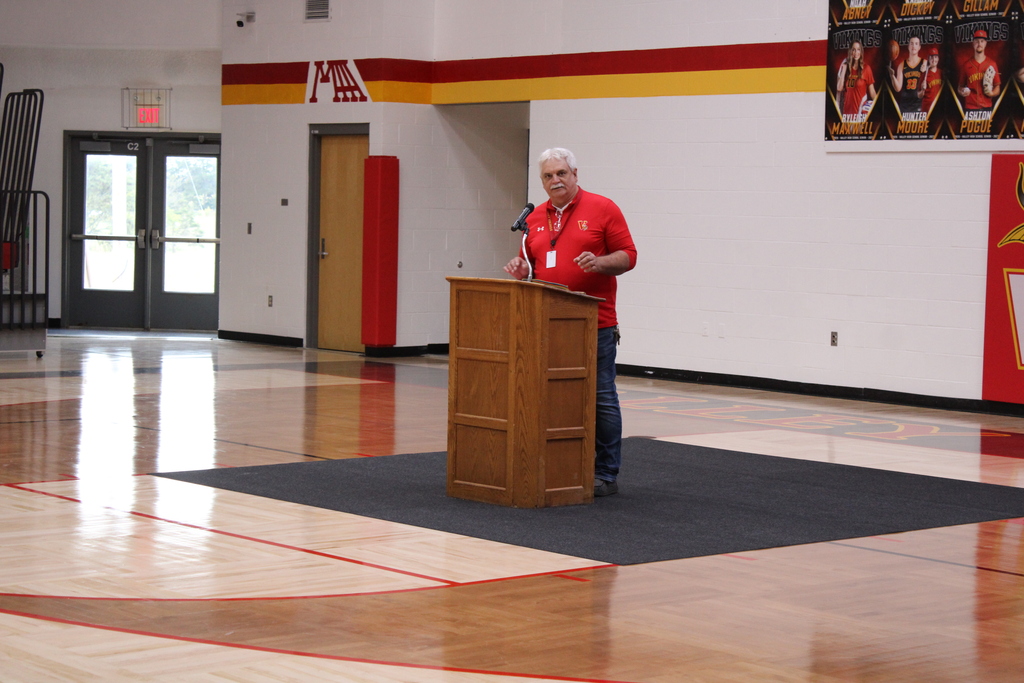 Man speaking at podium