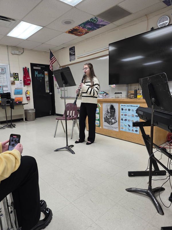 Student Playing Instrument
