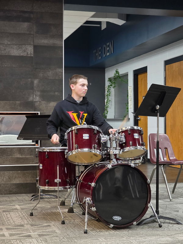Student Playing Instrument