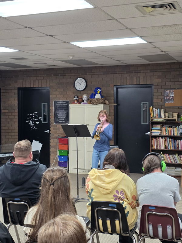 Student Playing Instrument
