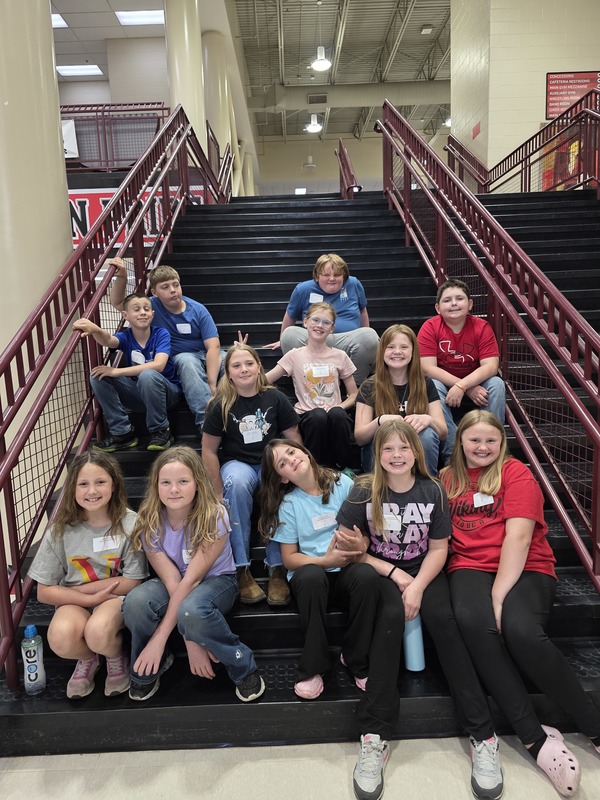 Students posing on stairs