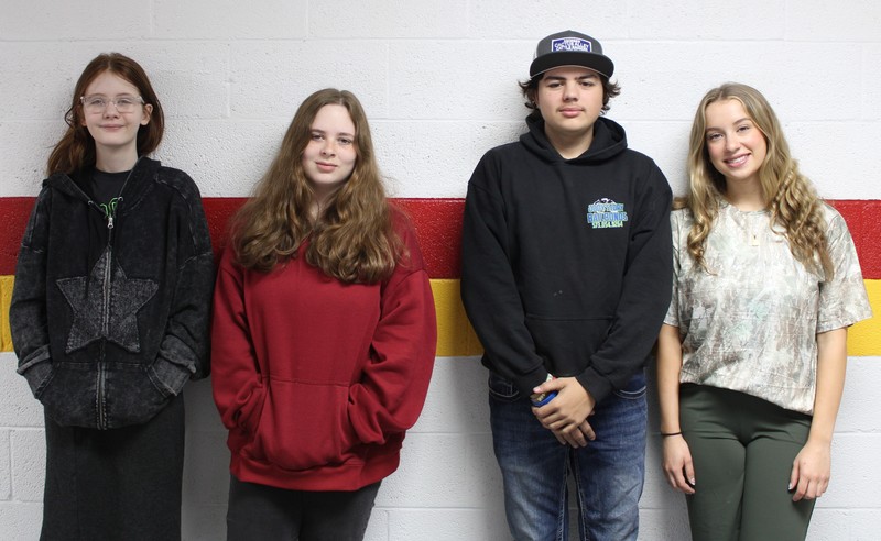 Students posing for award