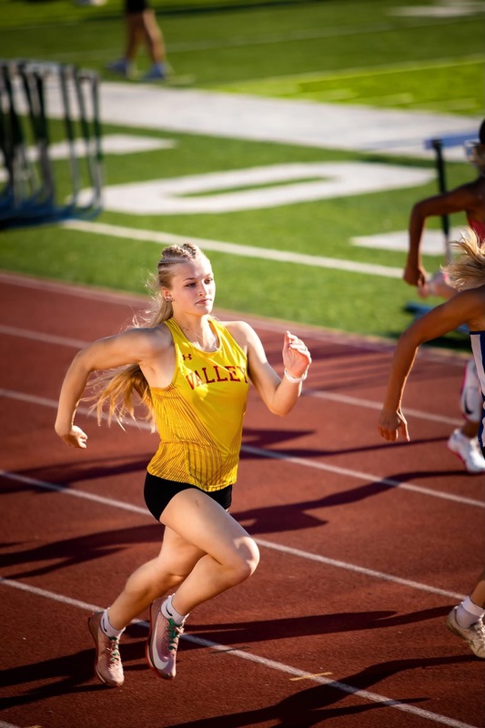 Student Running in Track Meet