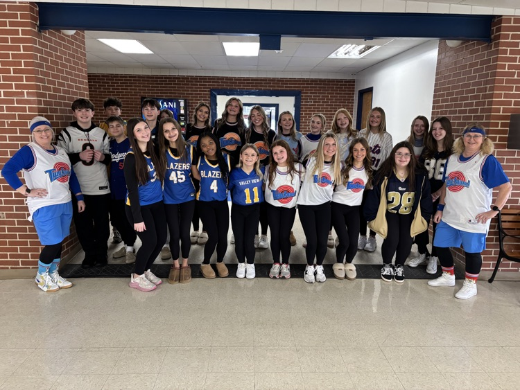 big group of students in jerseys