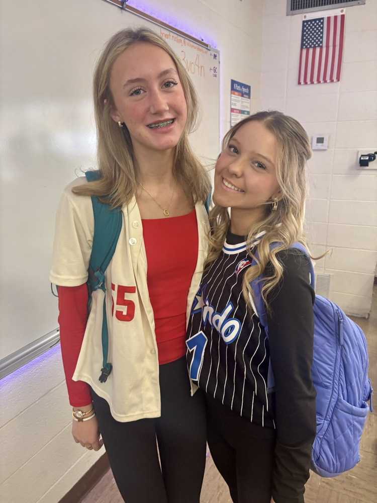 two girls in jerseys