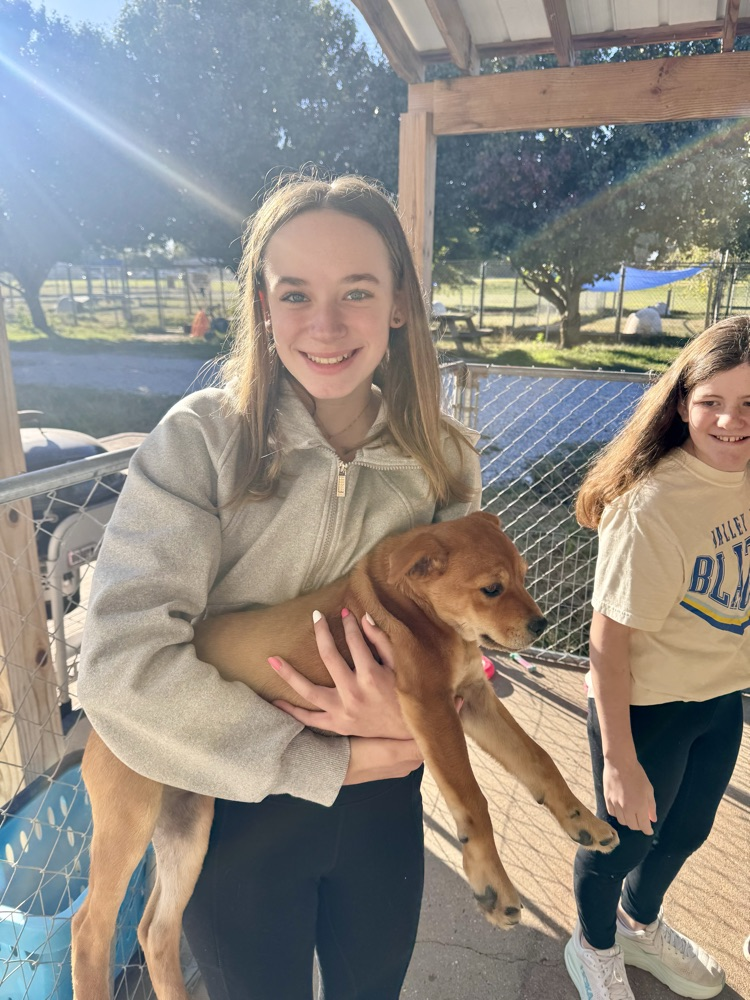 student with dog