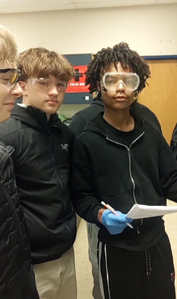 students in science lab preparing for expierments