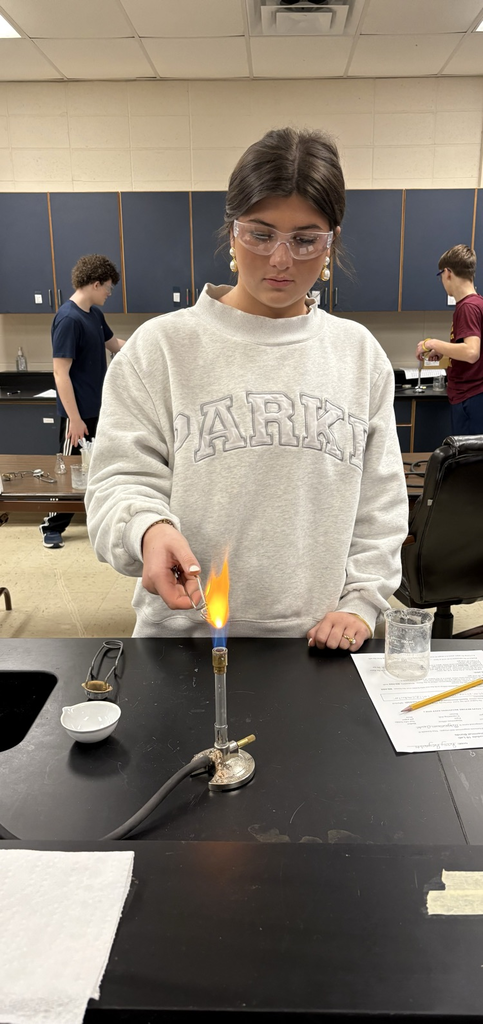 student burning magnesium
